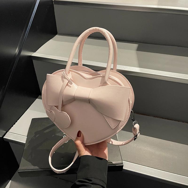 

Trendy Love Shaped Small Handbag Butterfly Knot Single Shoulder Bags Fashion Versatile Heart Pendant Crossbody Bag CLE 22x7x20cm розовый