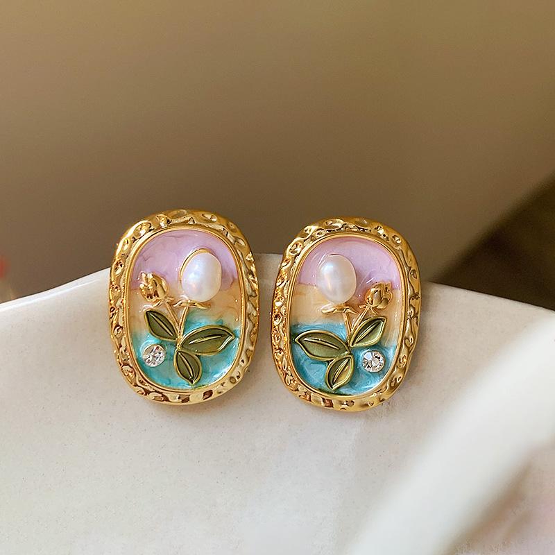 

Silver needle dripping oil flower pearl diamond stud earrings niche simple versatile earrings temperament light luxury high-end earrings women