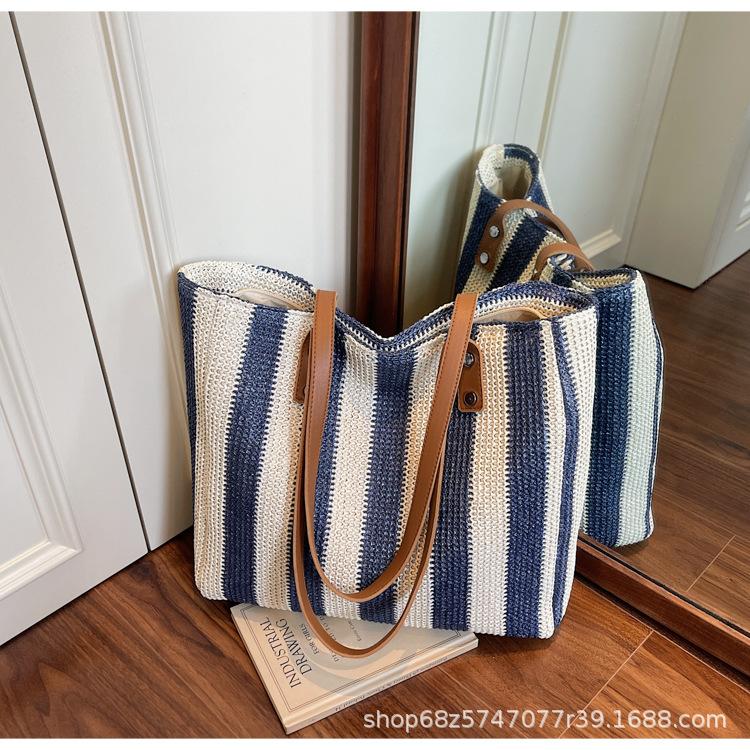 

Spring and summer foreign style handbag women s 2025 new Korean version of wild grass woven underarm tote bag fashion shoulder bag синий