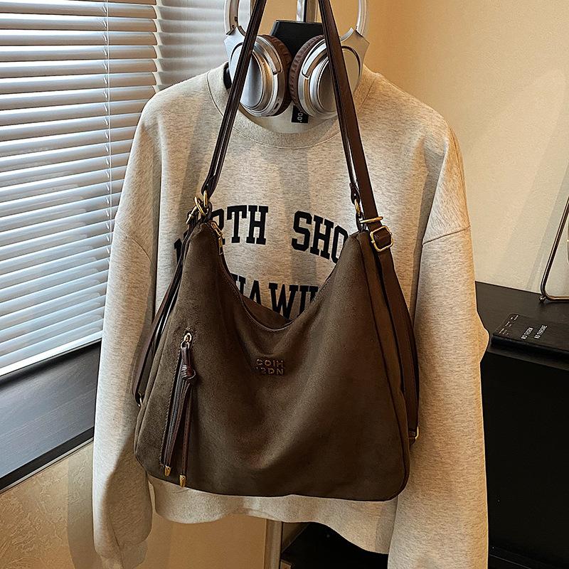 Lässige Pendler-Tragetasche Damen große Kapazität 2025 neue Schulter-Umhängetasche Retro-Mode leichter Rucksack