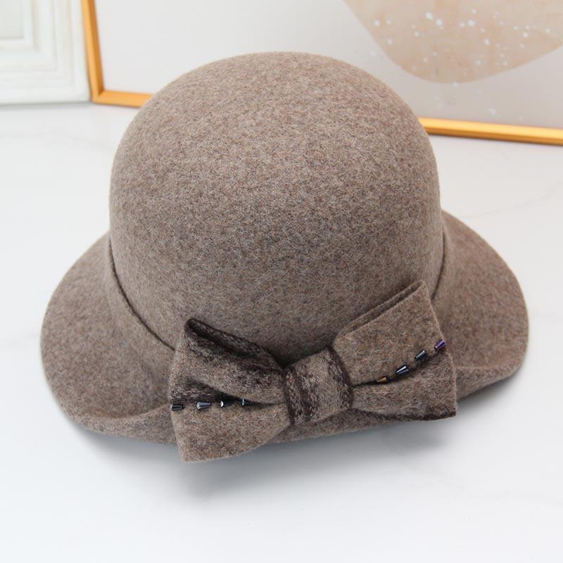 Autumn and winter hat women's thermal basin hat retro round top hat elegant bow fashion wool British fisherman hat