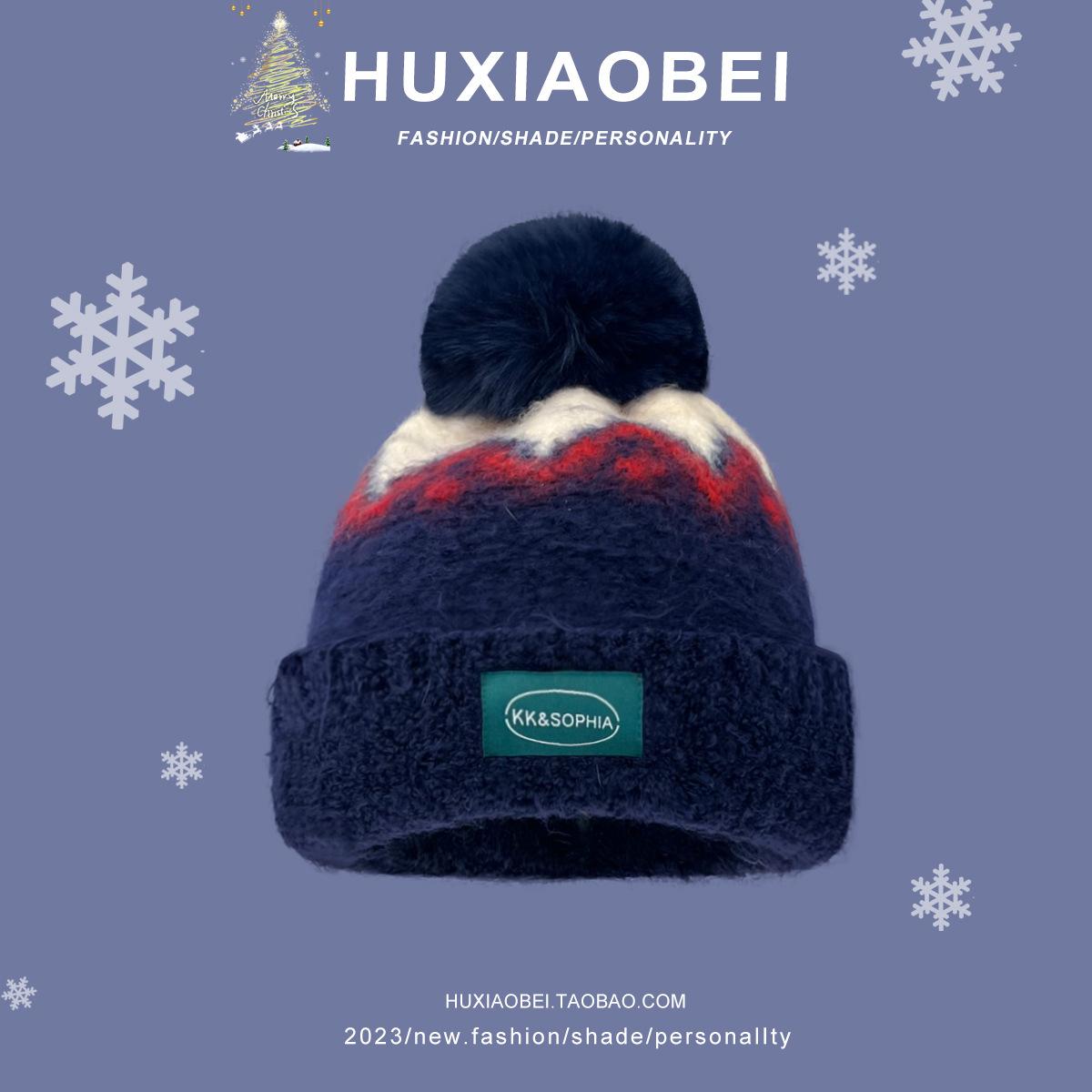 

Christmas New Year red knitted hat women s winter warm Korean version ins atmosphere cold ear protection ball pullover hat M（56-58cm） Темно-синій