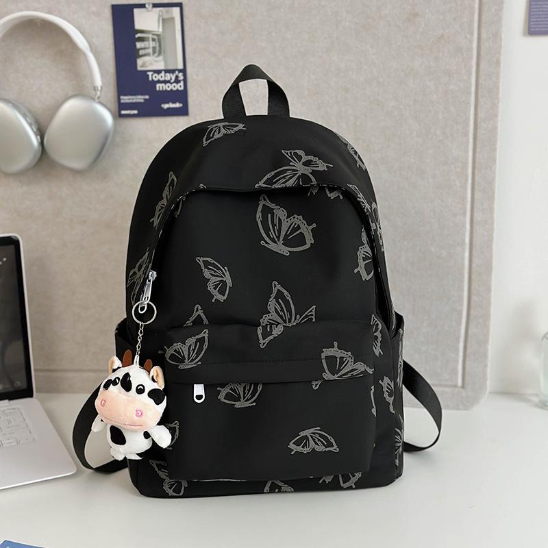 High-value reflective butterfly backpack, new junior high school girl high school student schoolbag ins niche travel backpack