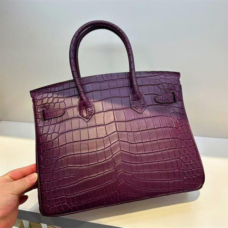 Pelle bovina primo strato motivo alligatore opaca portatile a spalla a tracolla borsa da donna premium transfrontaliera