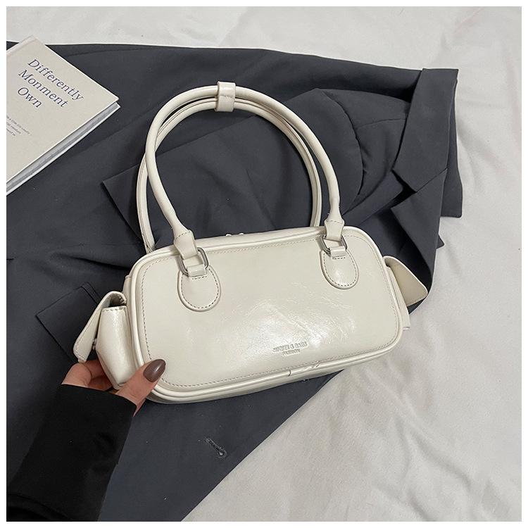 

Премиальный сенс 2025 новая сумочка легкая роскошь нишевая универсальная сумка-бостон большая вместимость модная сумка на плечо женская