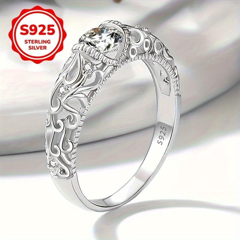 Elegant925Silver women's ring with hollow-carved design, round and classic, suitable as an engagement or wedding anniversary gift. Comes with a gift