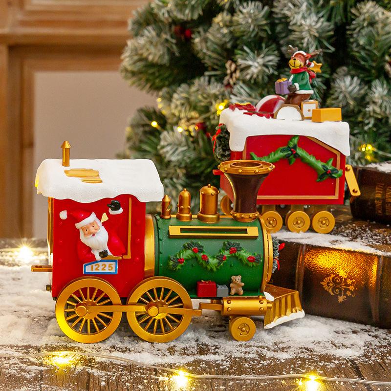 Weihnachts-Gleisbahn Weihnachtsbaumschmuck Atmosphäre Szene Anordnung Geschenke