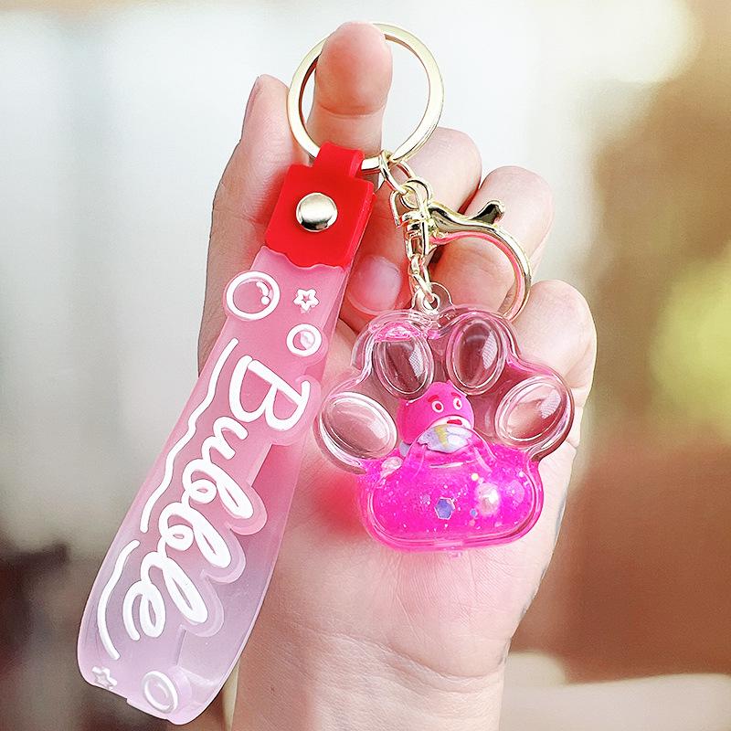 Strawberry Bear Doll Keychain with Colorful Oil-Filled Bottle and Milk Tea Cup Pendant