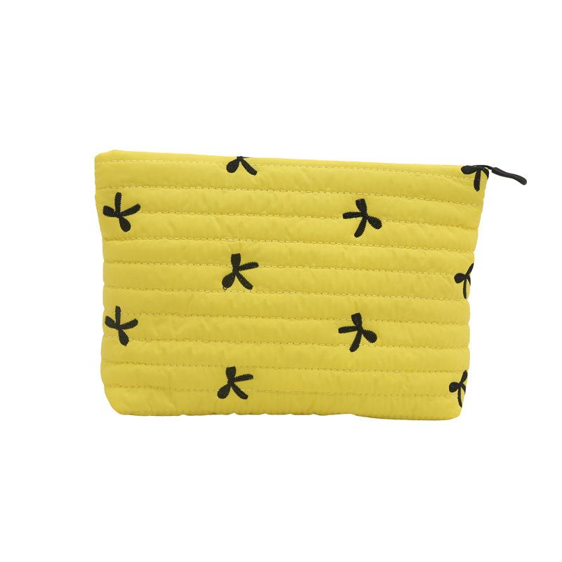 

Spring and summer new fashion embroidered bow padded bag women s cosmetic bag large capacity wash storage bag clutch bag жёлтый