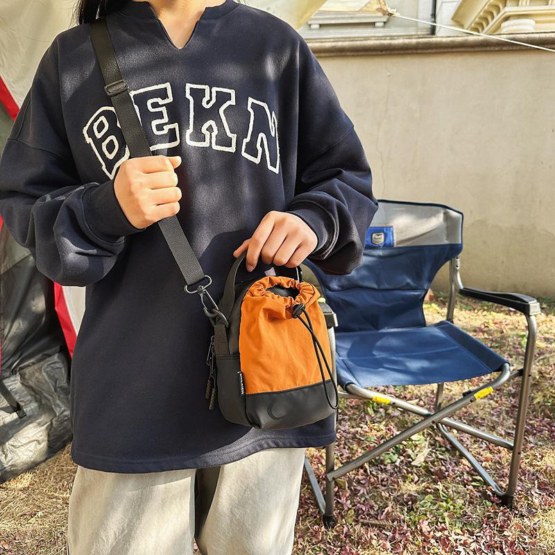 Niche sports messenger bag casual small bag street men and women simple 2025 spring trend shoulder bucket bag