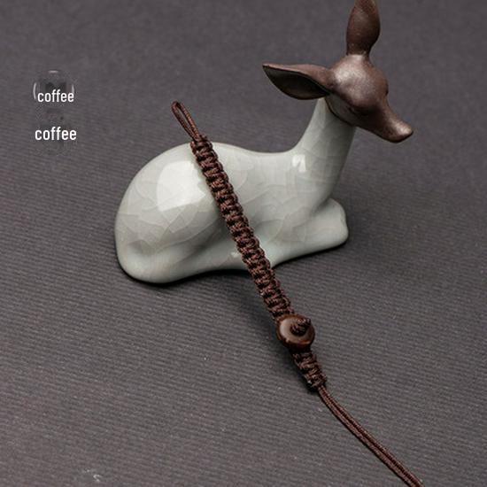 

Сплетенный вручную брелок с ромбовидным узлом - подвеска своими руками с простой пряжкой