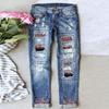 Jeans elasticizzati stampati a fiori blu da donna Pantaloni a vita alta Pantaloni skinny strappati con toppe in denim distrutto