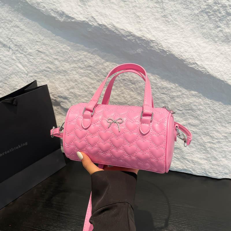 New summer popular casual and beautiful fresh solid color bow cylinder bag portable shoulder messenger bag women's bag