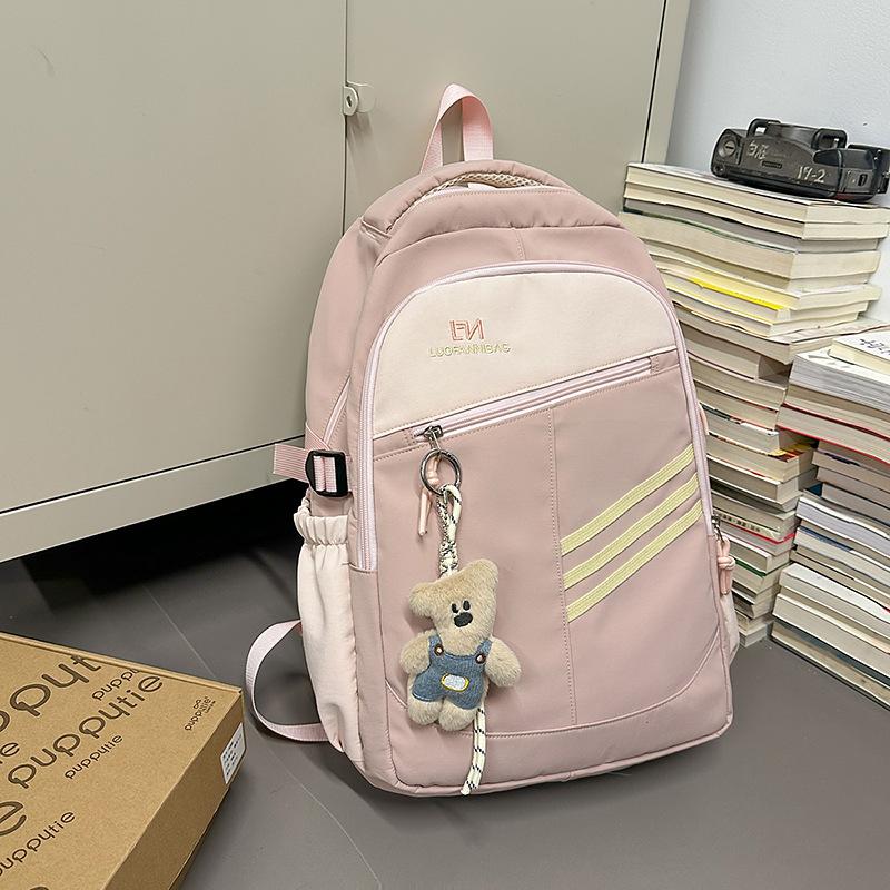 

Korean version of large-capacity schoolbag female high school student lightweight backpack college student high value simple travel niche backpack single bag розовый