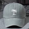 A Unisex Lightweight Fashionable Baseball Cap with a Coconut Tree Print Suitable for Boys and Girls in a Vintage Washed Style