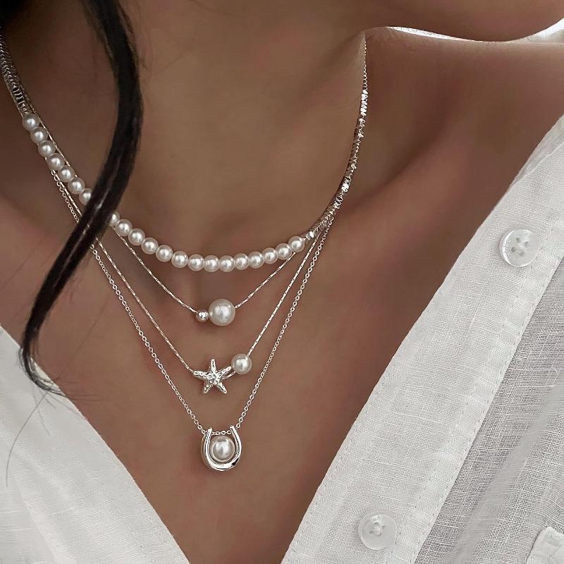 

Imitation pearl necklace fashion retro light luxury niche high-end collarbone chain star pendant women s necklace