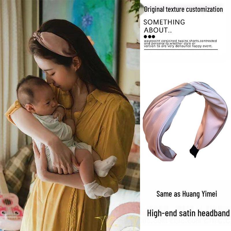 

Rose Huang Yimei s Summer 2024 Wide-Brimmed Bow Headband