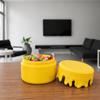 Decorative yellow container with a screw-on lid for small items