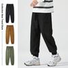Men's American-Style Autumn Overalls: Fashionable, Casual, Versatile Nine-Point Pants with Loose Cuffs and Multi-Pocket Design.