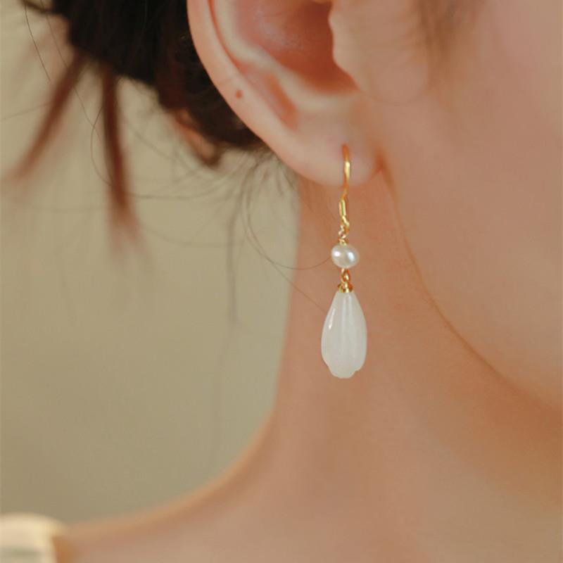 

Magnolia and Hetian jade earrings for women, unique design, elegant and stylish, new summer model, Chinese style Magnolia flower and Tiany