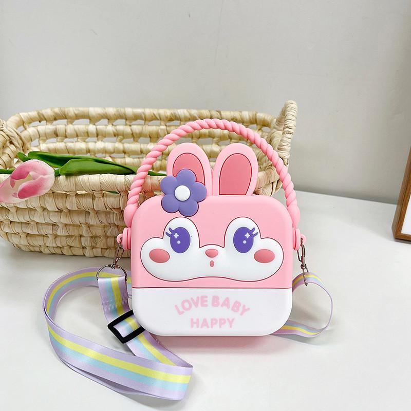 Entzückender Regenbogen-Cartoon-Silikon-Kinderrucksack mit 3D-Kaninchenlächeln und stilvollem Design