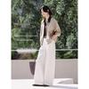 Veste courte à revers en cuir tressé pour femme