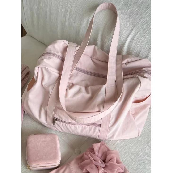 Pink casual large-capacity bag for women, new fashion commuter simple niche design travel gym bag