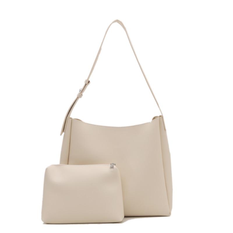 Large-capacity commuter bag women's spring new child and mother bag retro fashion soft leather shoulder bag portable tote bag