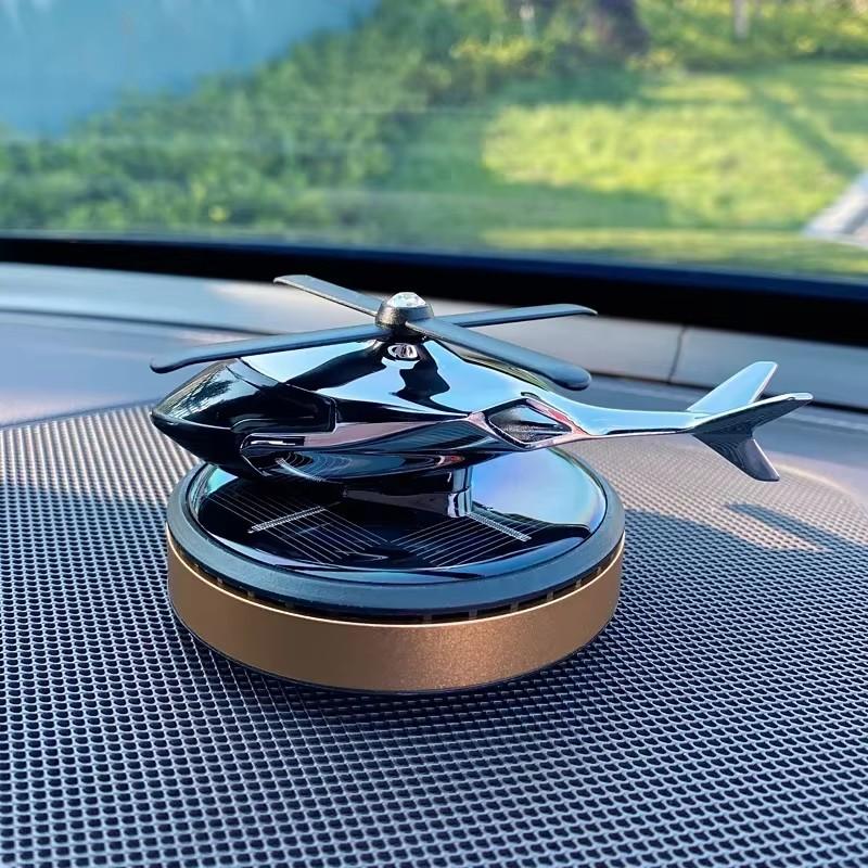 Car perfume decoration Solar rotating aircraft creative personality car console decoration supplies