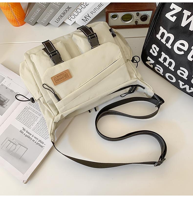 Schoolbag women's messenger bag tide brand ins tooling style Japanese casual men's bag large capacity shoulder bag personalized mailman bag tide