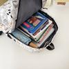 New high-value niche personalized graffiti comics trendy cool backpacks for men and women lightweight large-capacity backpacks