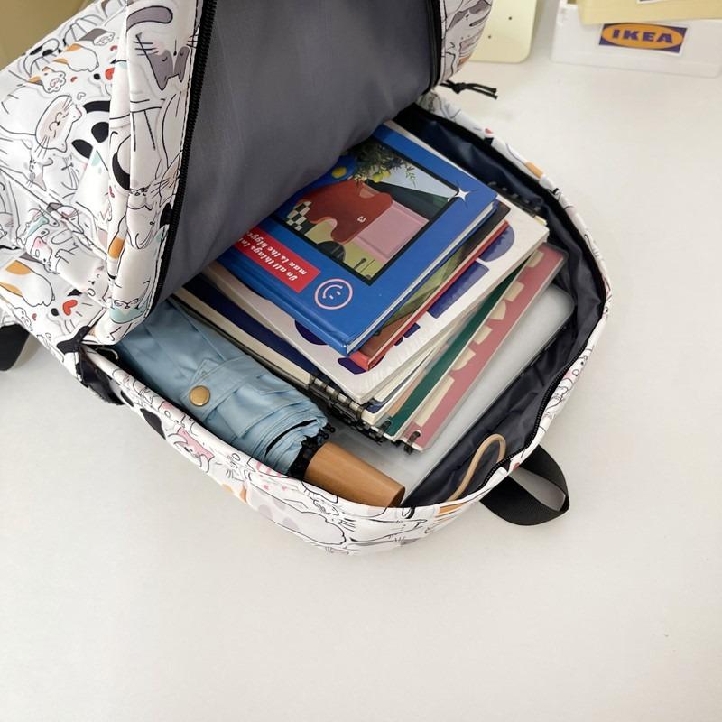 New high-value niche personalized graffiti comics trendy cool backpacks for men and women lightweight large-capacity backpacks