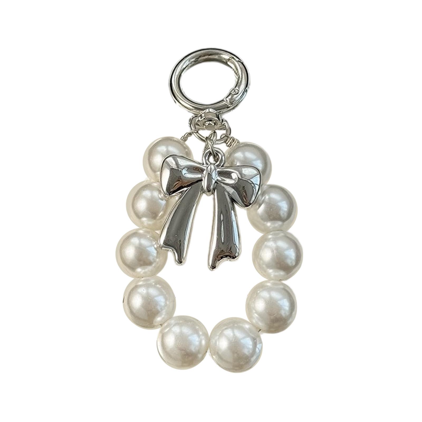 

Елегантний брелок із штучними перлами та бантом. Брелок із акриловими намистами. Модна підвіска для сумок і рюкзаків. 2
