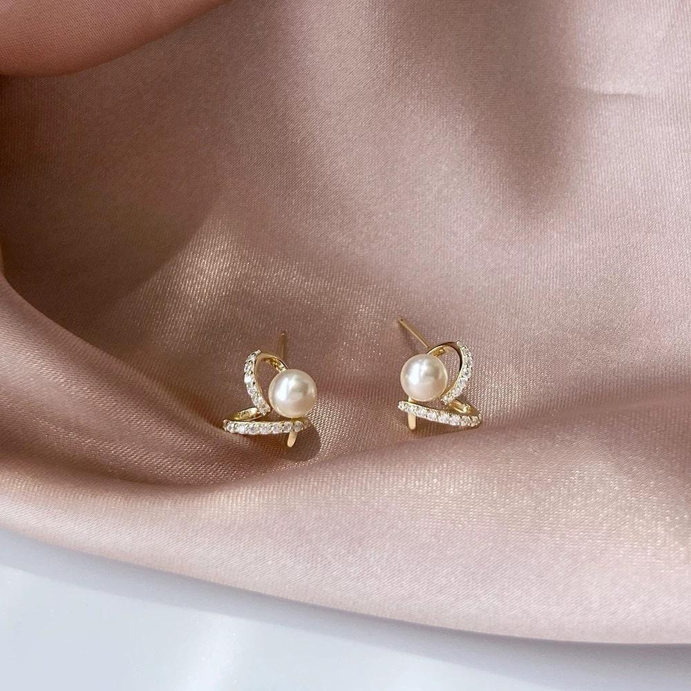 Simple pearl stud earrings new small peach heart elegant ear jewelry sweet niche love hollow earrings women
