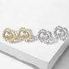ZAKOL Geometric Hollow 8 Shaped Imitation Zircon CZ Earrings Temperament Buling Zircon Party Zircon Accessories