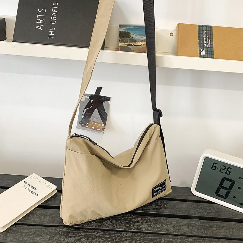 

Nylon cloth bag women s large-capacity new summer simple and versatile shoulder messenger bag casual commuter bag легкие хаки