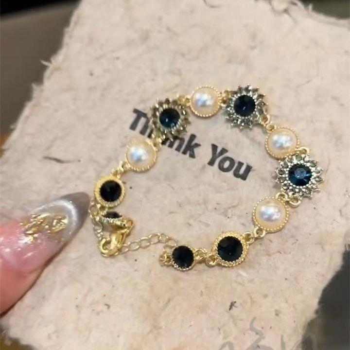 Sonnenthematischer Schmuck Handkette mit Imitationsperlen und funkelnden Strasssteinen für Damen