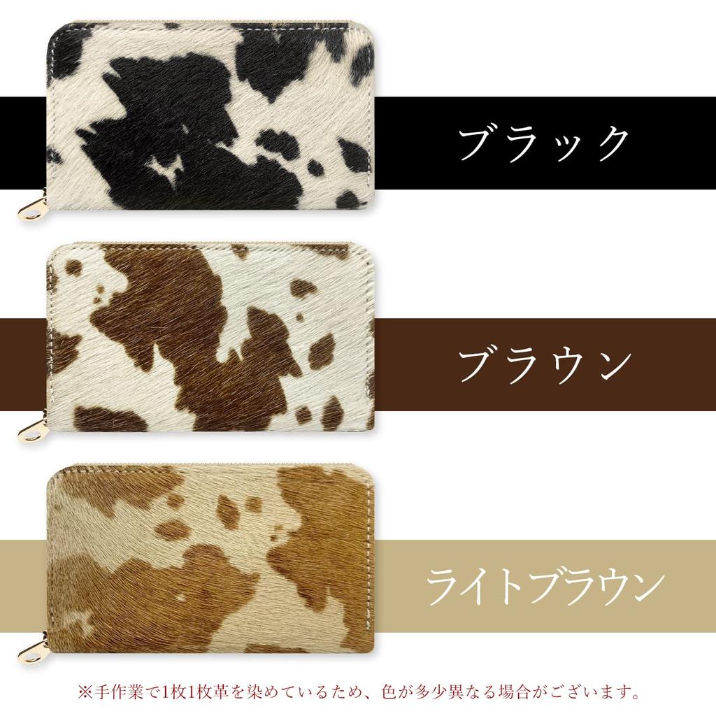 Genuine cowhide leather coin purse for women, round zipper closure, compact, simple, luxurious cowhide leather, perfect for sophisticated women.