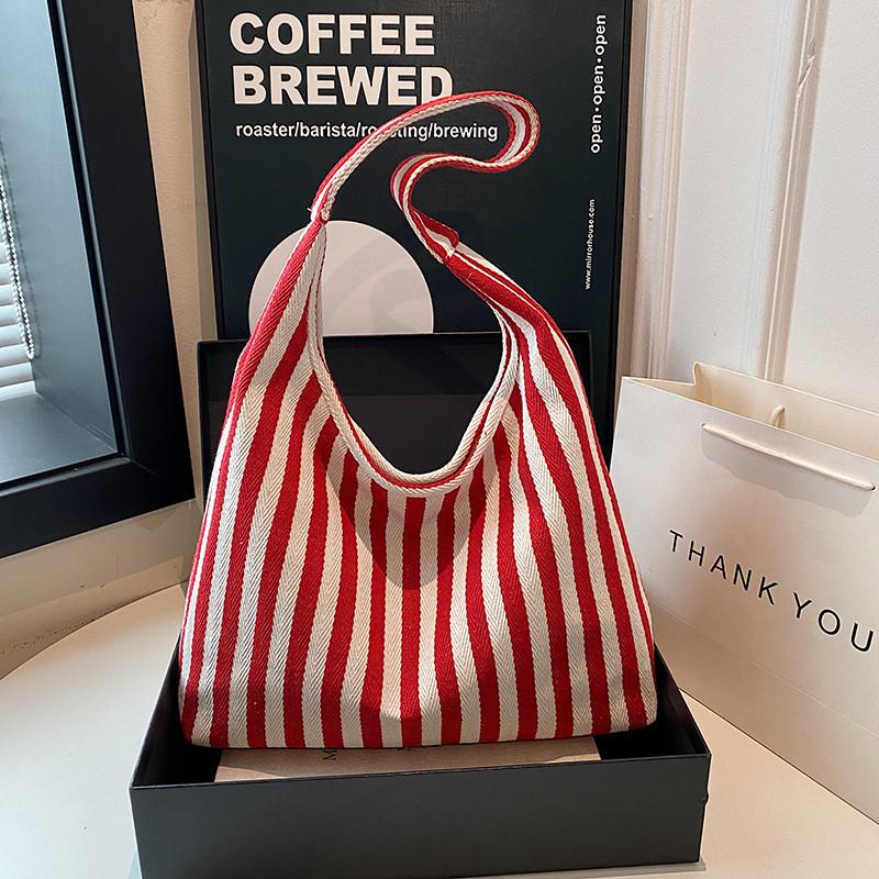 Retro Fashion Handbag Made Of Knit Cloth With Top Handle And Casual Design