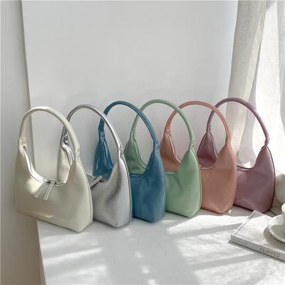 Bolsa de mão pequena de PU de primavera para mulheres, bolsa de nicho de alta qualidade, bolsa de ombro fashion brilhante para mulheres