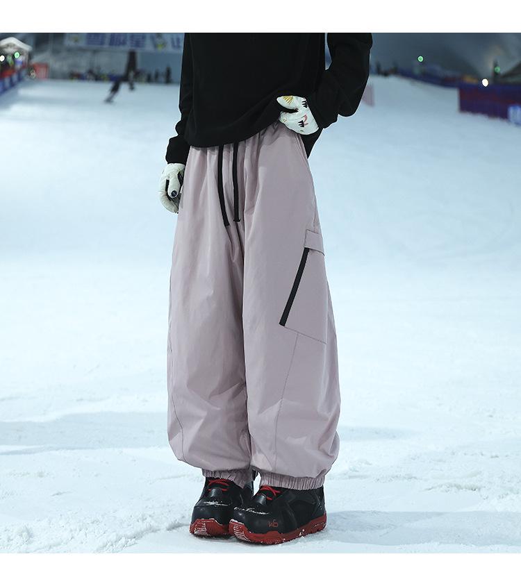 Unisex Waterproof & Windproof Ski Pants for Extreme Cold, Ideal for Northeast China Winters, Mountaineering, and Snowboarding.