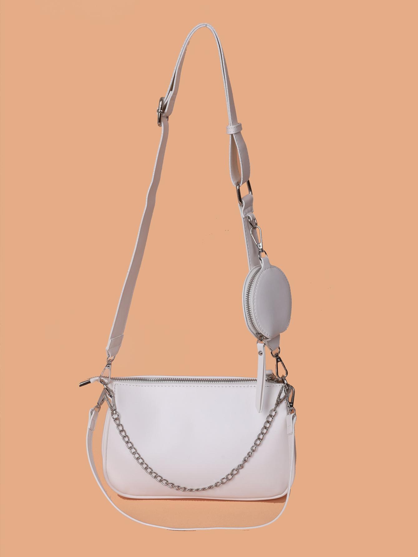 

2025 новая сумка женская нишевая высококлассная сумка-мессенджер ретро универсальная в гонконгском стиле сумка под мышкой цепочка на плечо тренд белый