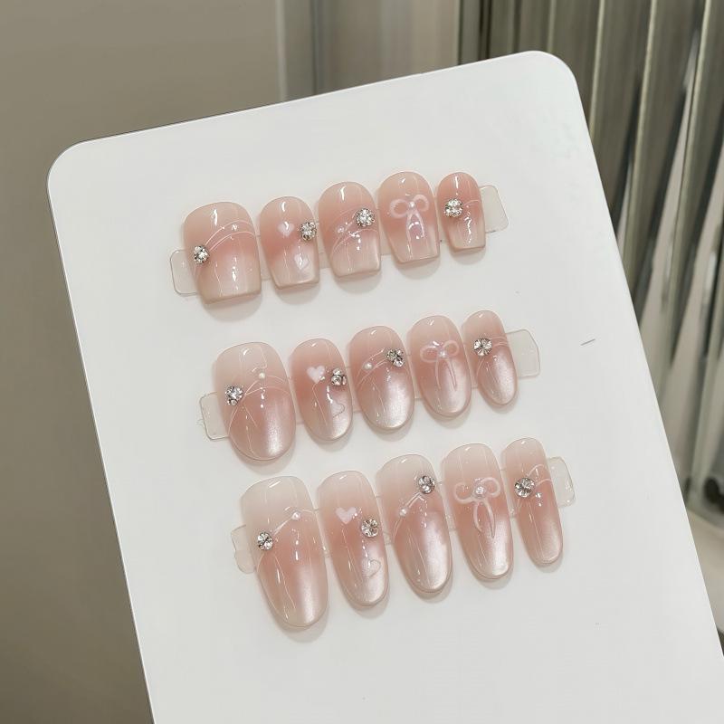 Gentle Blush Gradient Cat Eye Manicure with Butterfly Accents