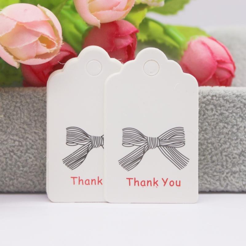100 szt. + 100 sznurków 3x5 cm biały/papier kraft. Dziękujemy za ręczne wykonanie zawieszki do etykiety
