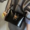 Hand carry trendy bucket bag women's autumn new niche fashion simple shoulder bag high value casual women's bag