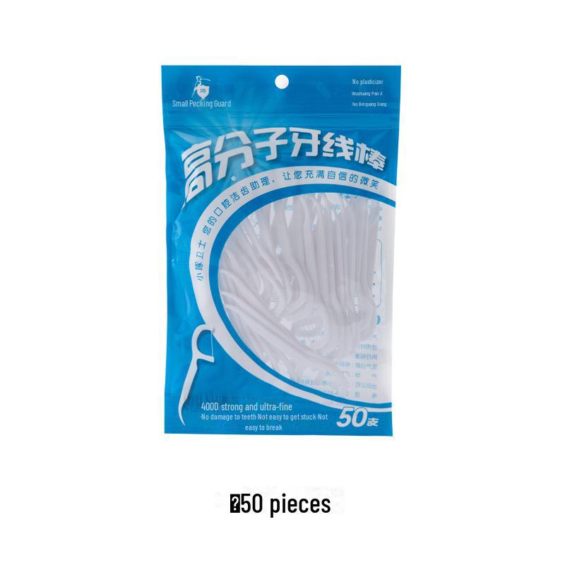 Ultratenká polymerová dentální nit v tyčince s klenutým párátkem a mezizubním kartáčkem