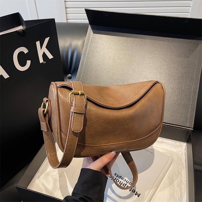 

Niche Retro Shoulder & Crossbody Bag: 2025 Trendy Women s Versatile Commuter Dumpling Design