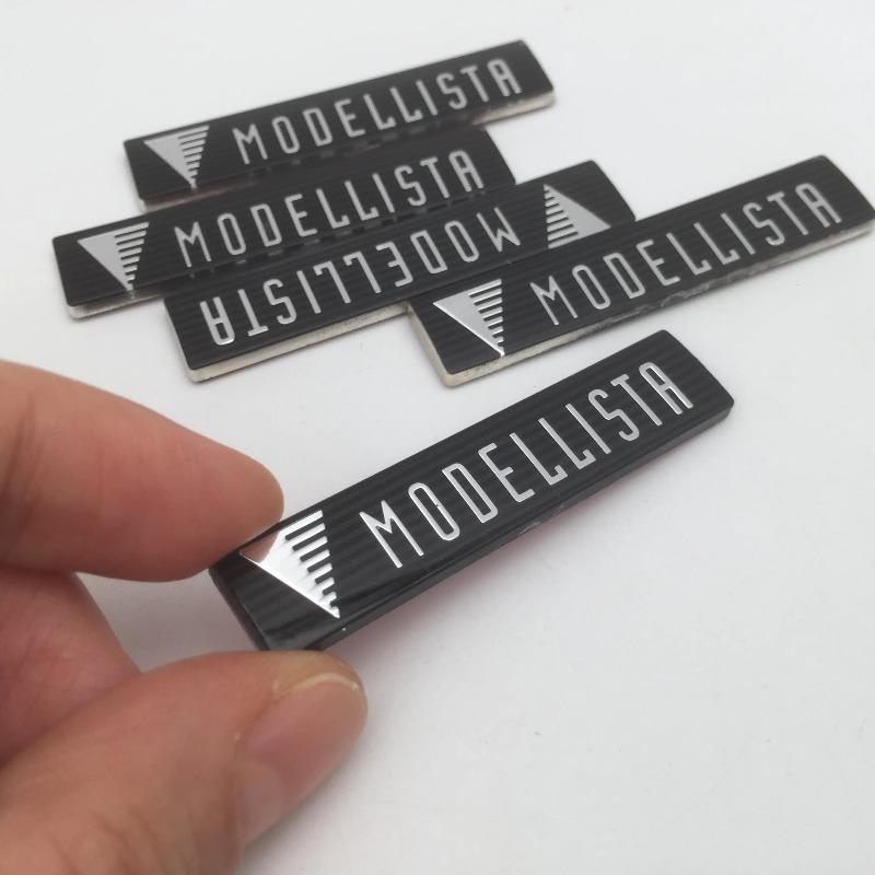 1pcs forMODELLISTA Car Front Lip Small Label Grill Fender Side Rear Trunk Badge Emblem Sticker Decals Styling Auto Accessories