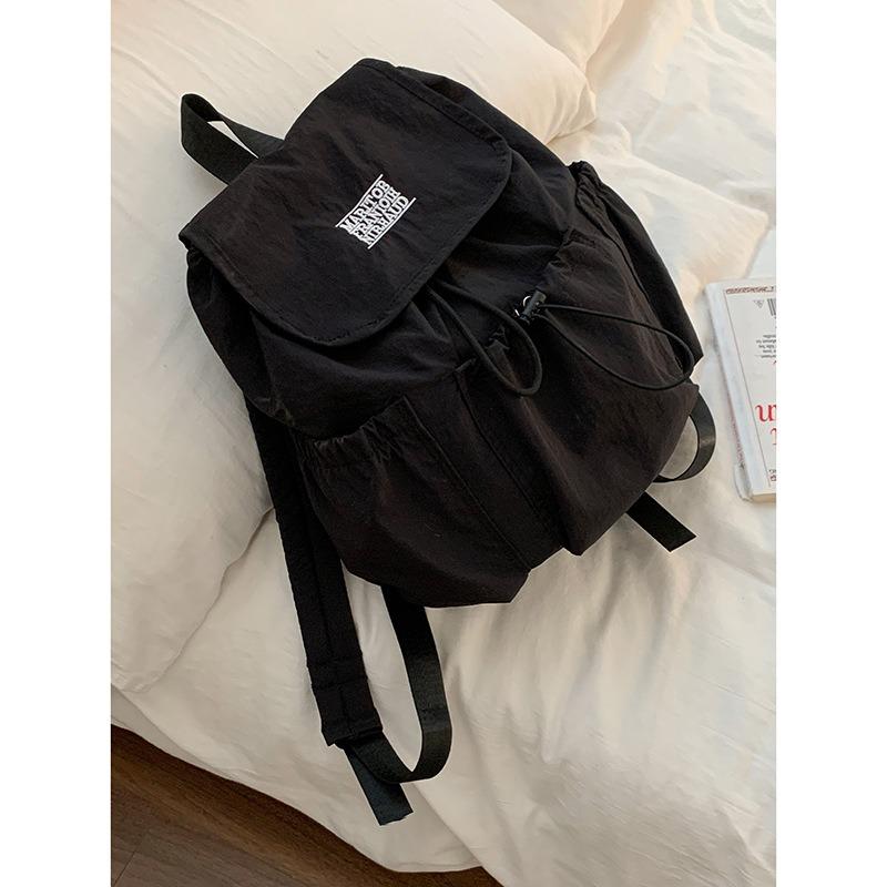 A Fashionable Letter Backpack with A Simple and Large-capacity Travel Bag