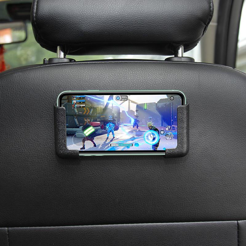 A Universal Mobile Phone Holder Made for Car Dashboards, Featuring a Gravity Automatic Clamping Mechanism, Compatible with Smartphones